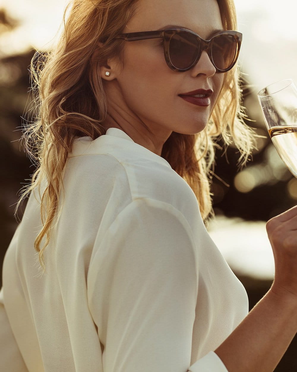 Beautiful microneedling female model in a white blouse